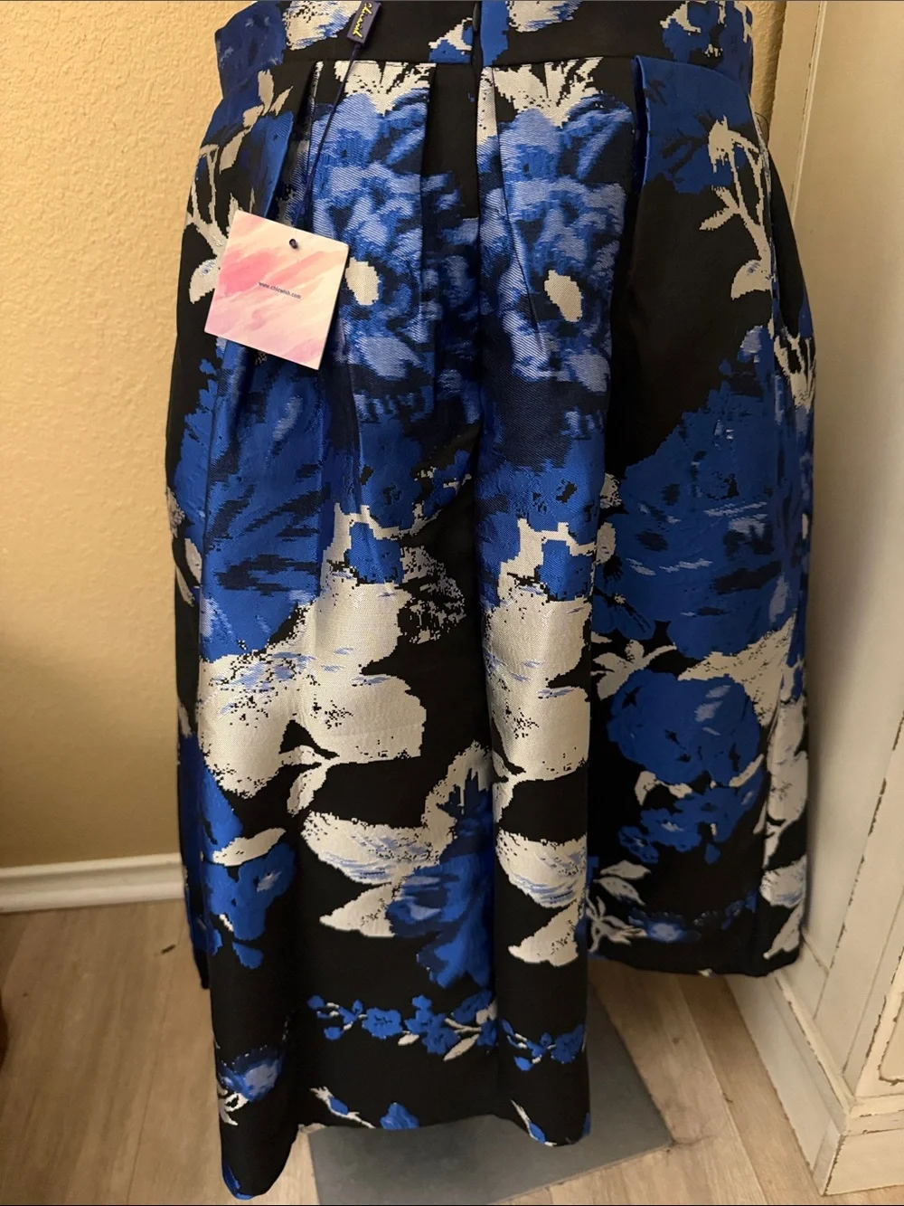 Chicwish Black Midi Skirt with Bold Blue and White Floral Print